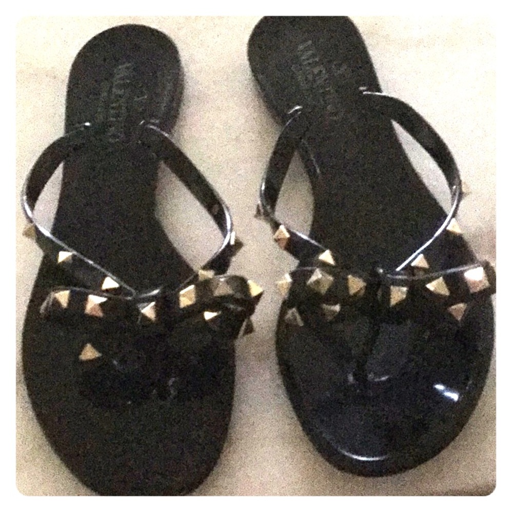 Valentino Garavani rock-stud rubber sandals.